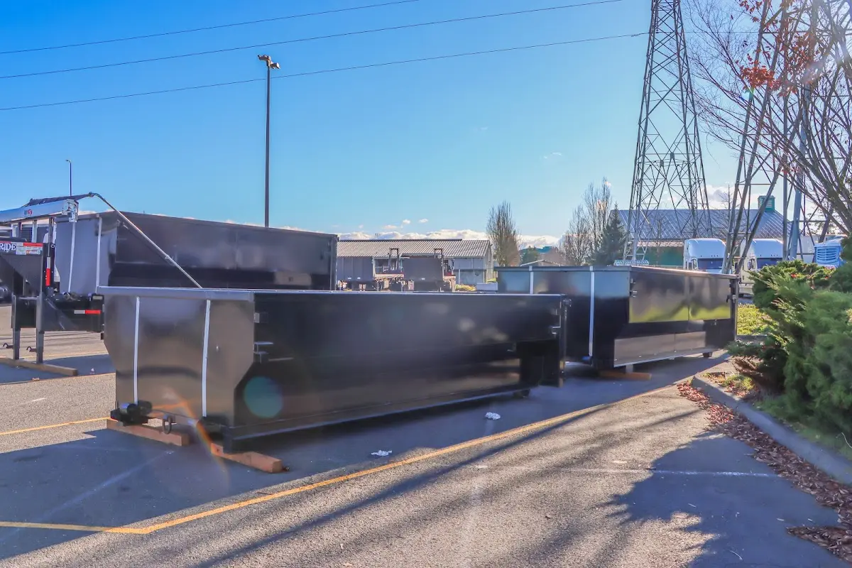 Roll-off dumpster ready for waste disposal at job site for 2 Yard Dumpster Rental in Hammond
